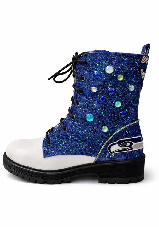 Blue glittery boot with white sole and black sole on a white background