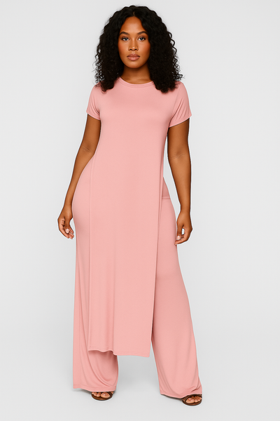 Woman wearing a pink dress on a white background