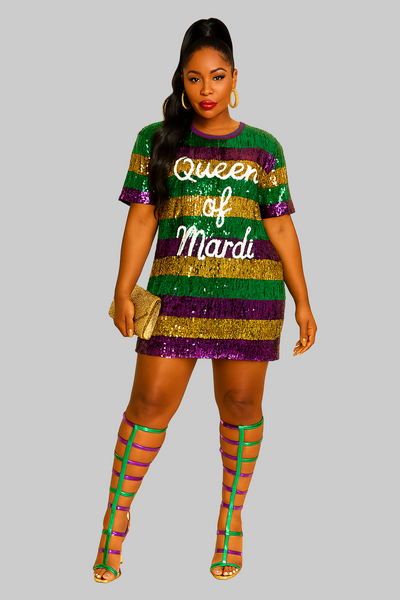 Woman wearing a colorful sequin dress with 'Queen of Mardi' text on a beige background