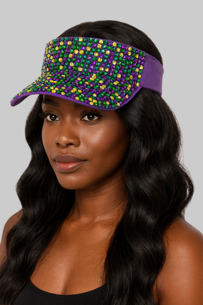Woman wearing a colorful beaded visor against a white background