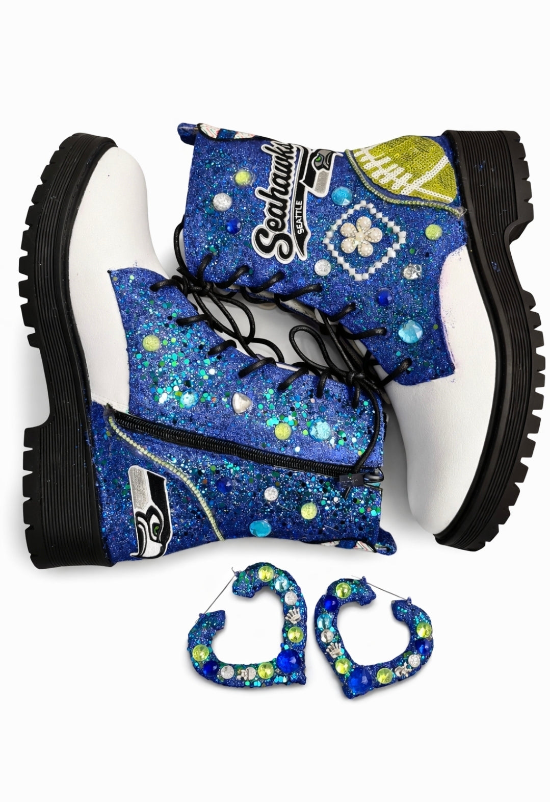 Blue glittery boots with decorative elements and matching earrings on a white background