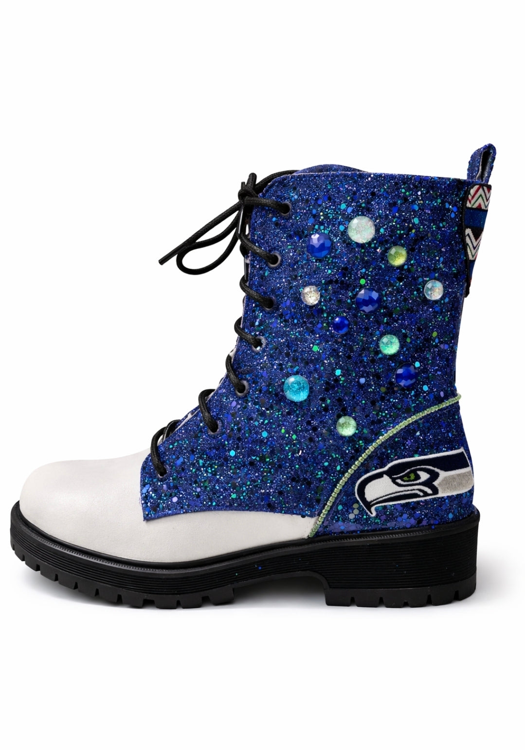 Blue glittery boot with white sole and black sole on a white background