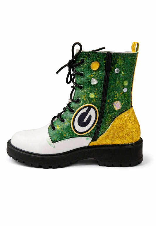 Green and yellow boot with a logo on a white background