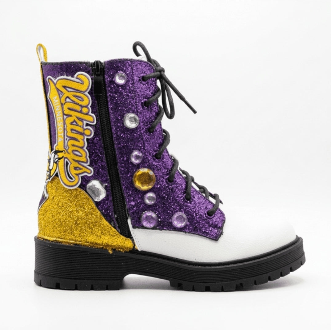 Purple glittery boot with gold accents on a white background
