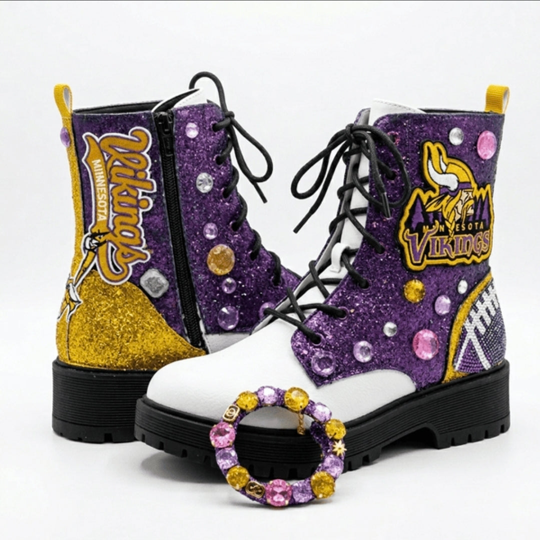 Purple and white boots with Viking logo and decorative elements on a white background