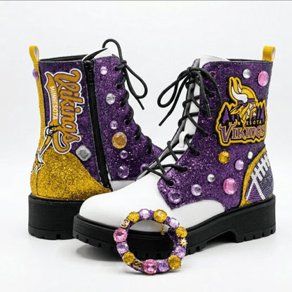Purple and white boots with Viking logo and decorative elements on a white background
