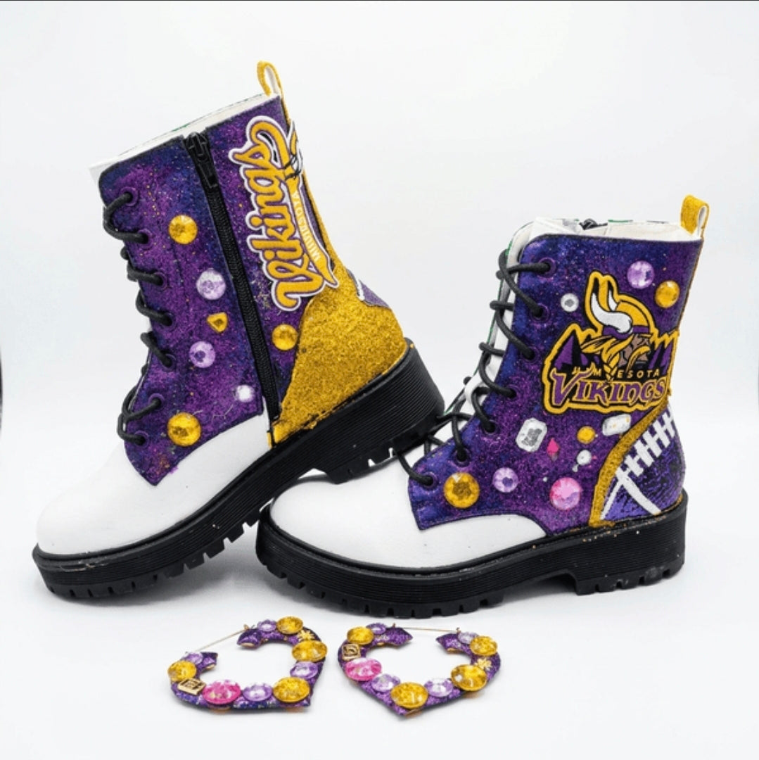 Decorative boots with Viking logo and purple glittery design on a white background