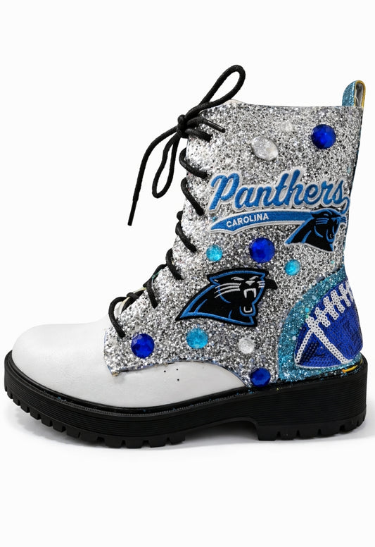 White boot with Carolina Panthers logo and decorations on a white background