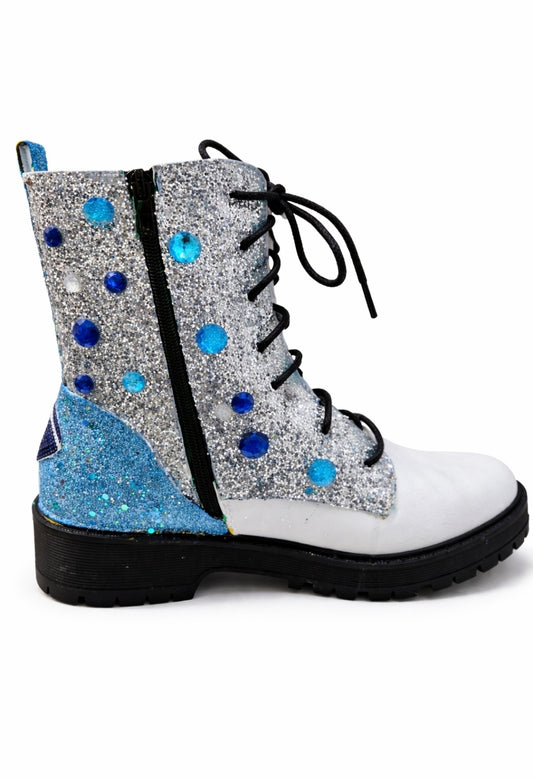 Glittery boot with blue and silver accents on a white background