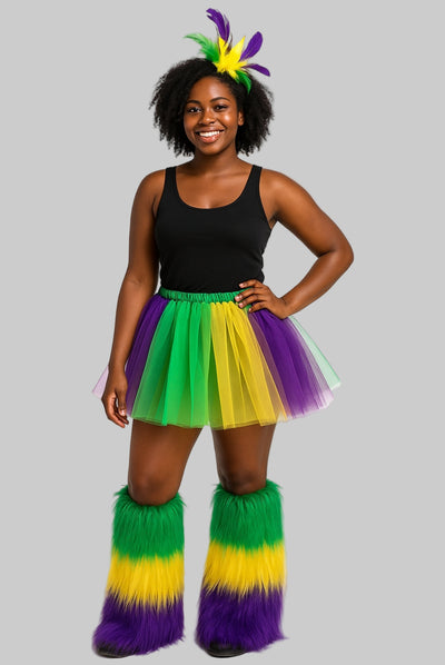 A woman dressed in a Mardi Gras outfit consisting of a tutu skirt in shades of purple, green, and yellow, matching leg warmers, and a headband with feathers and sequins.