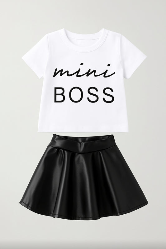 White t-shirt with 'mini BOSS' text and black leather skirt on a light gray background